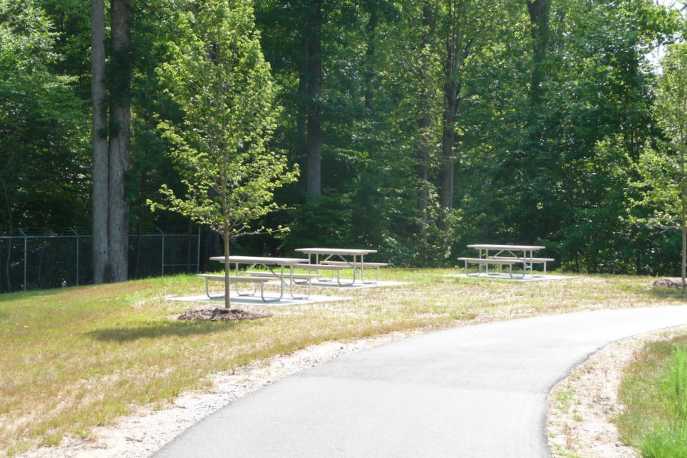 picnic tables on the paved trail picnic tables on the paved trail