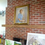 painting of Dr. Annie on fireplace mantel